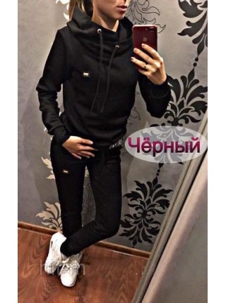 Жіночий спортивний костюм із стеганного трикотажу