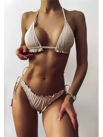 Бежевий жіночий купальник з рюшами в рубчик