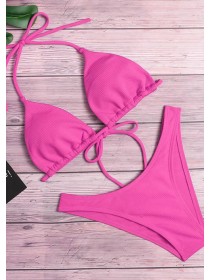 Рожевий купальник в рубчик плавки бразільяна