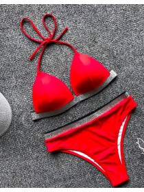 Яскравий червоний купальник з срібними блискітками