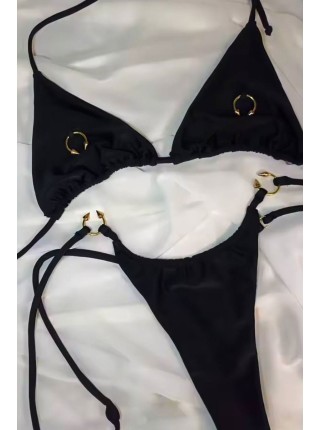 Черный женский треугольный купальник на завязках с пирсингом