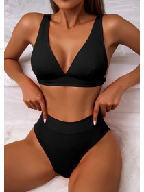 Чорний купальник з високими плавками в рубчик